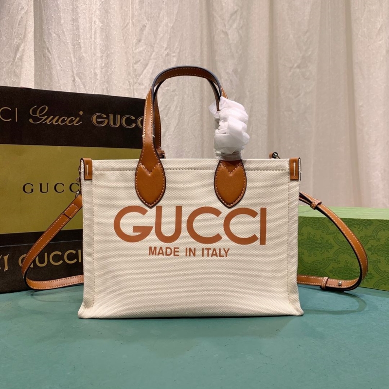 G*u*i shopping bags